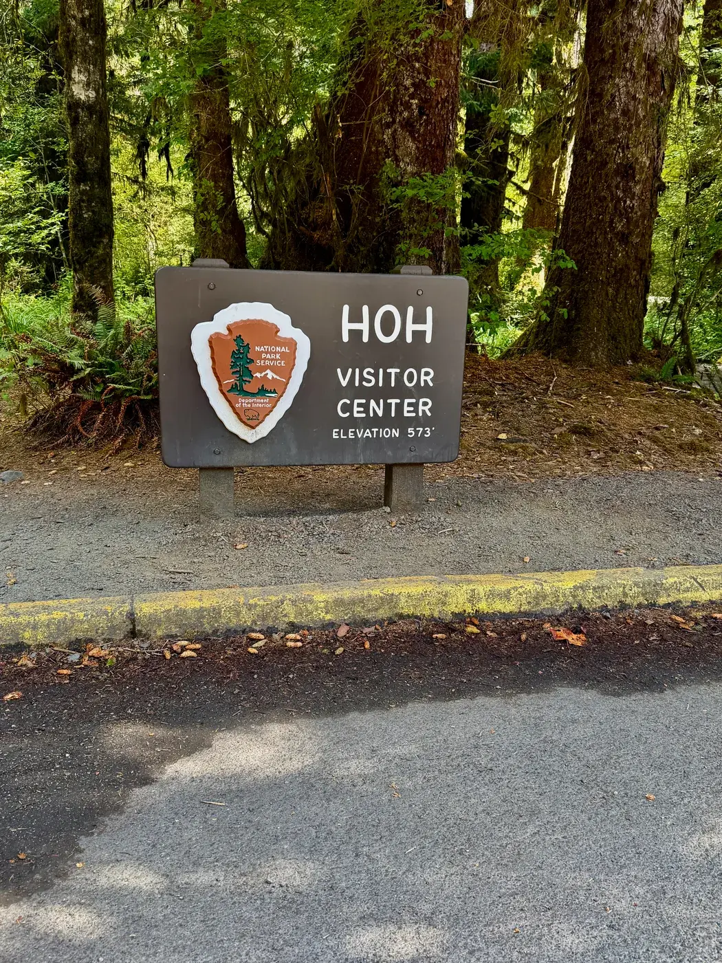 The rainforest visitor center sign