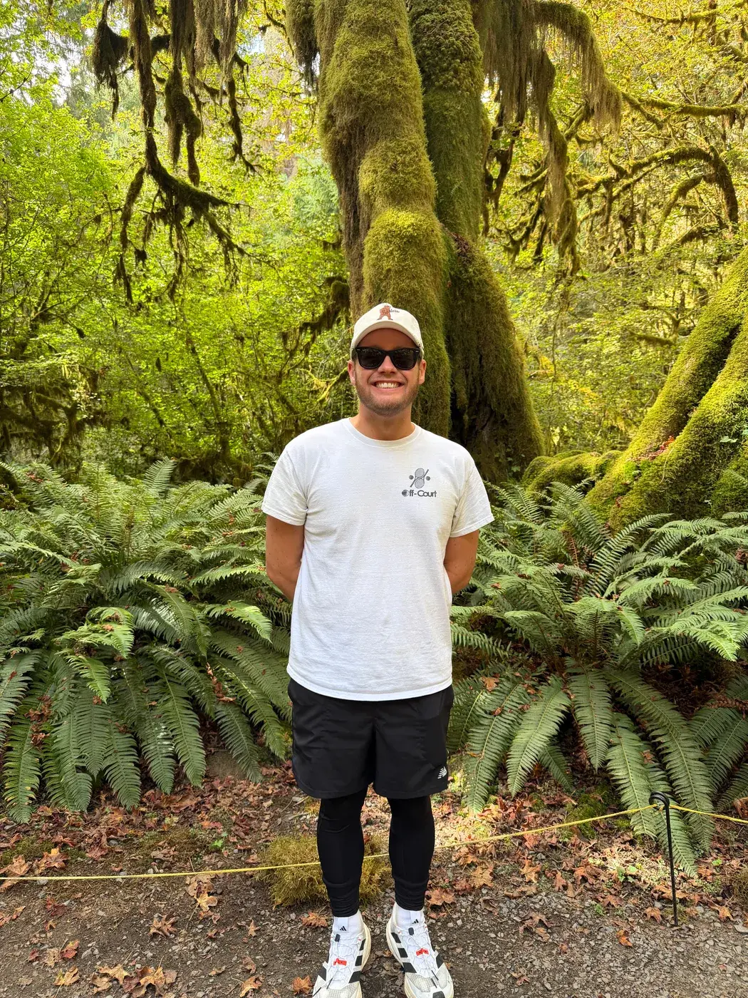 Traveler among moss-covered trees