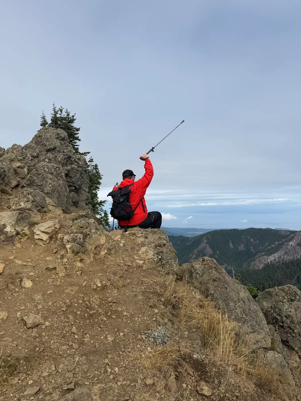 Traveler on a rocky viewpoint